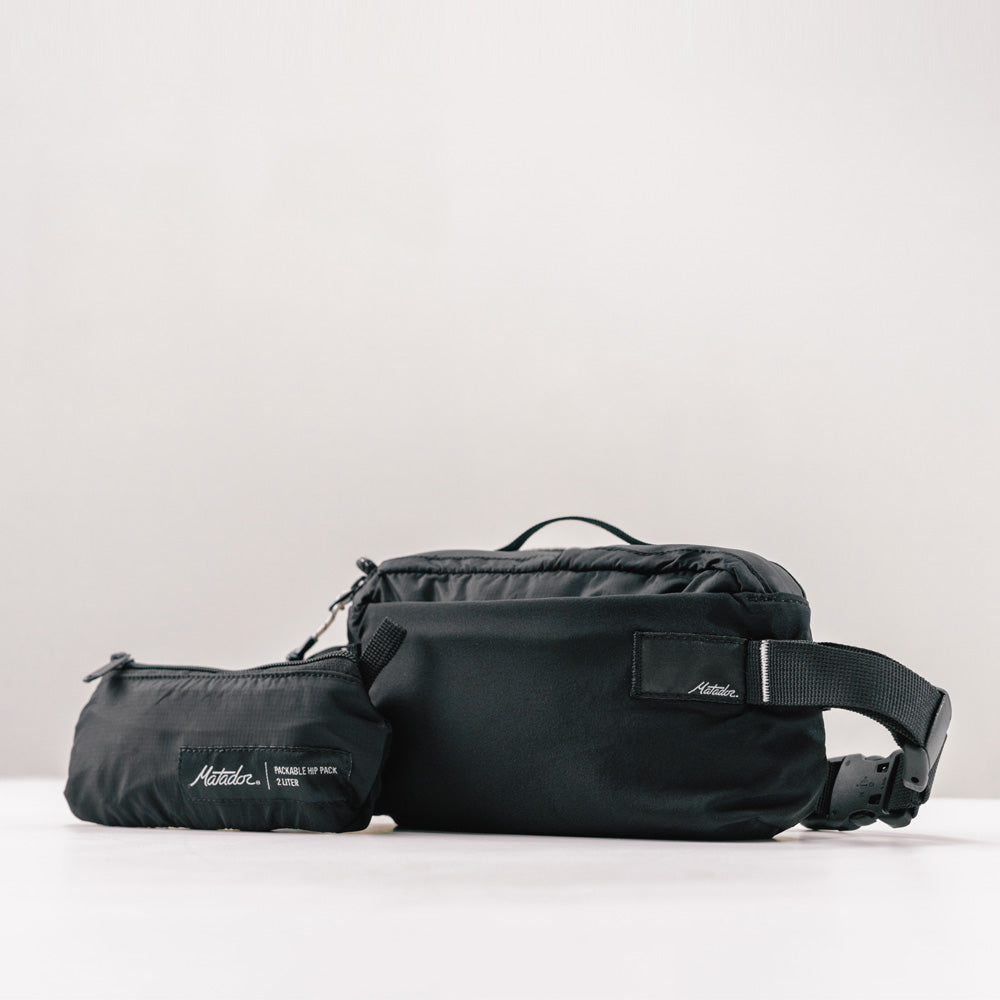 Matador ReFraction Packable Sling (black) - Ultraleichte, faltbare Hüfttasche für Städtereisen (2 Liter) von Matador